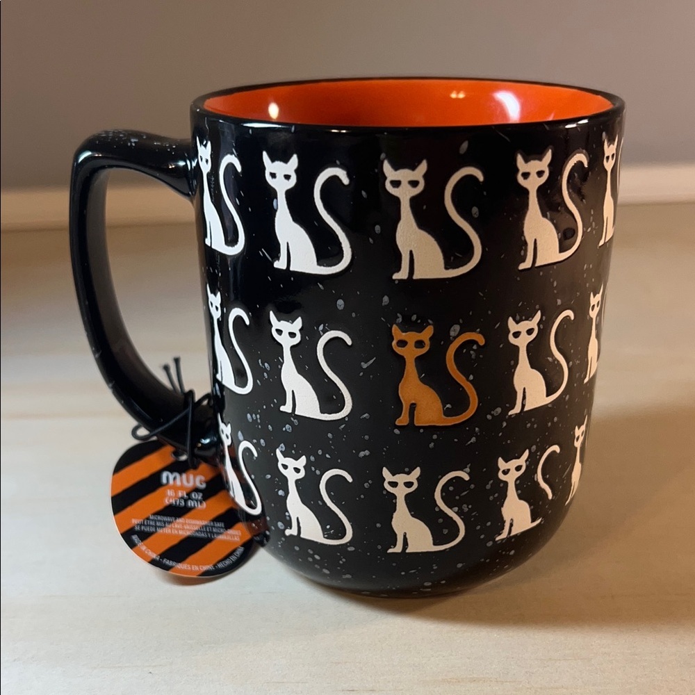 Black Cat Pattern Mug with Orange Interior